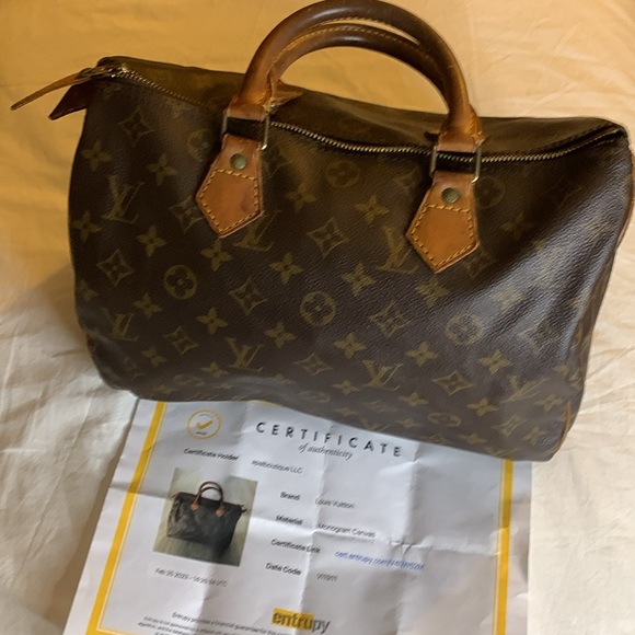 Authenticated Louis Vuitton Monogram Canvas with COA and lock and key #317 - Picture 5 of 16